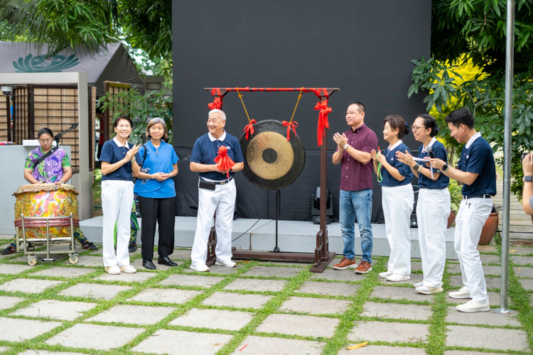 Tzu Chi Philippines CEO Henry Yuñez (third from left) strikes a gong, ushering good luck before the official opening of Fiesta Verde 2024. 