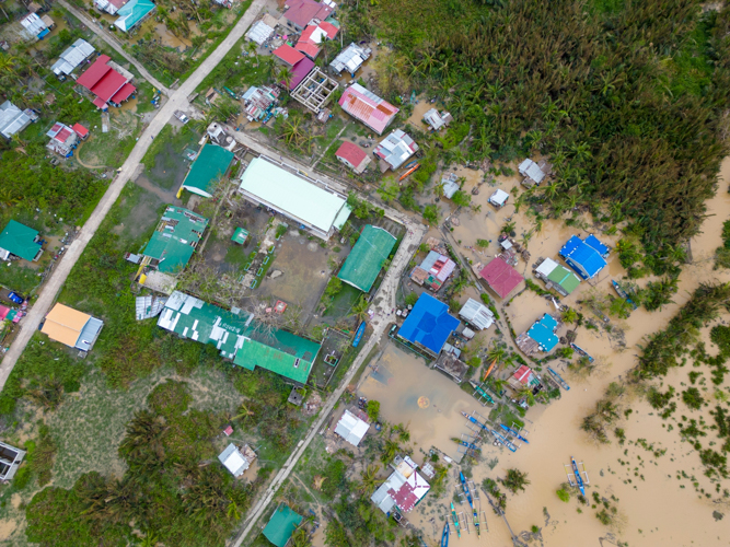 Aerial shot of Aparri, Cagayan, after the onslaught of four consecutive typhoons: Marce (Yinxing), Nika (Toraji), Ofel (Usagi), and Pepito (Man-Yi).