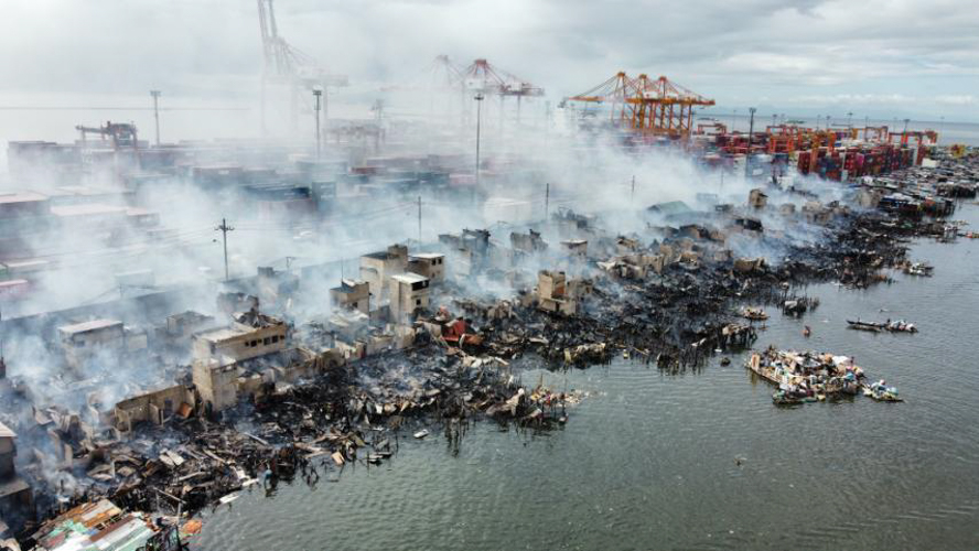 The fire was declared out after nearly eight hours, and the blaze left a scene of massive destruction. (Photo by GMA News Online)