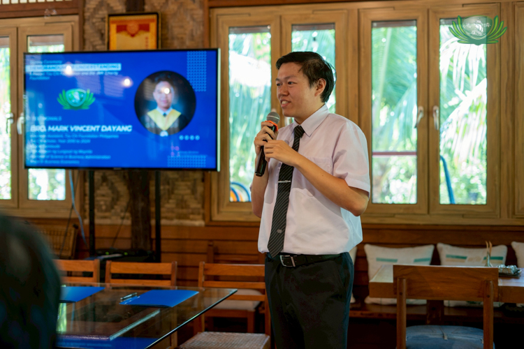 Clifford Co, partnerships officer from the Office of the CEO of Tzu Chi Philippines, welcomes guests and volunteers to the MOA signing.