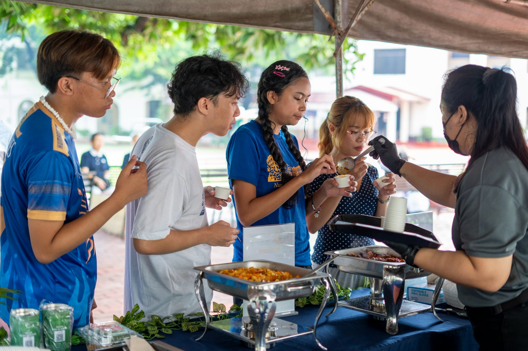 Curious students flocked to and lined up at the booth between their classes. 