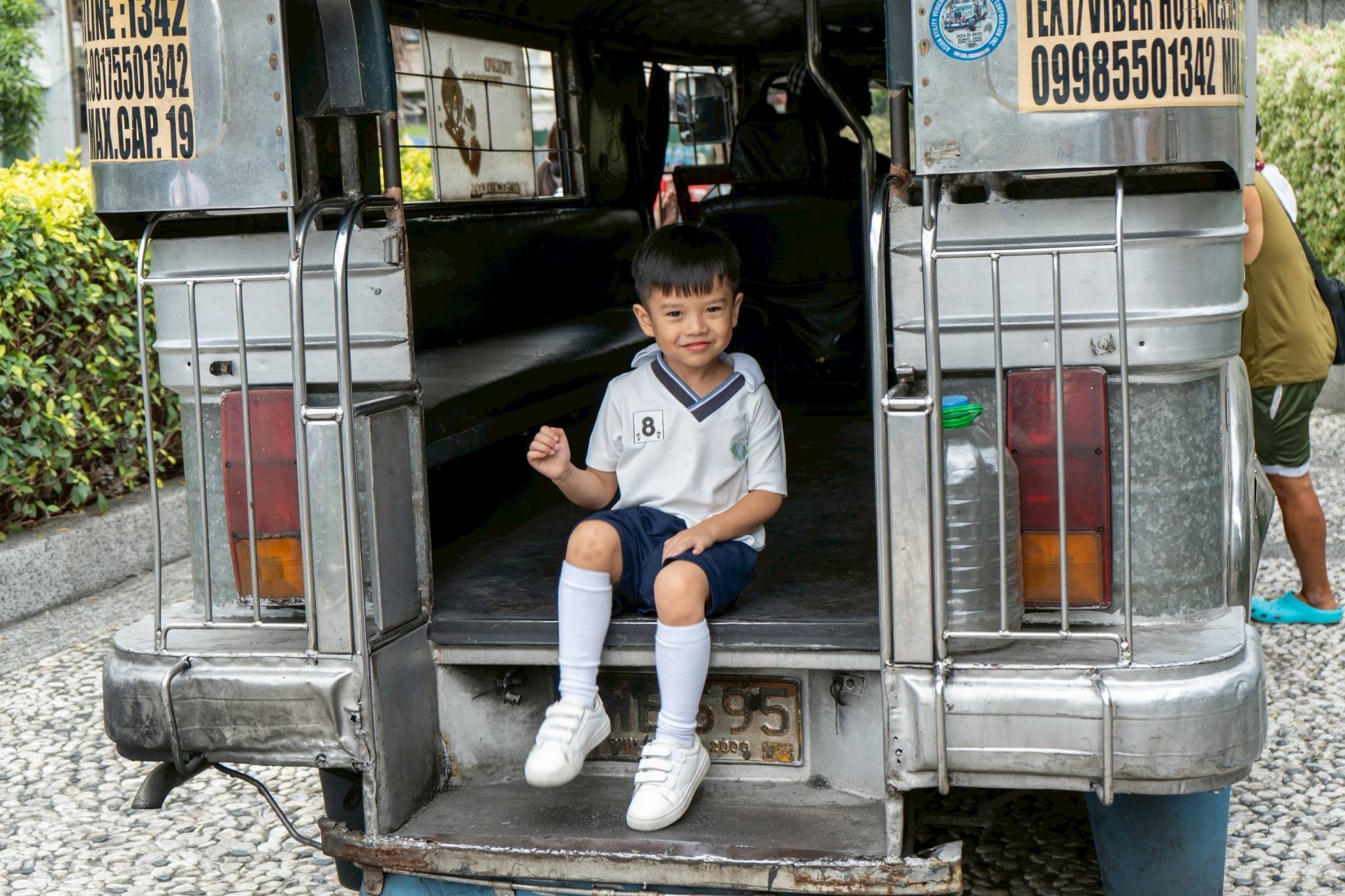 Gael Kaw poses inside the jeepney, capturing a memory of this fun learning experience.