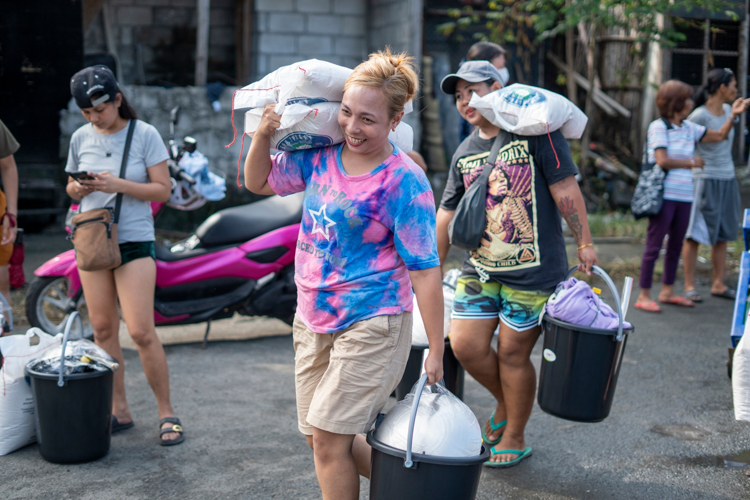 For Tzu Chi, this might be the most fulfilling reward to witness from a beneficiary—their sincere smiles full of hope.