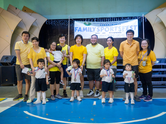 Team Sunshine smiles as they receive the second runner-up win during the sports fest. 