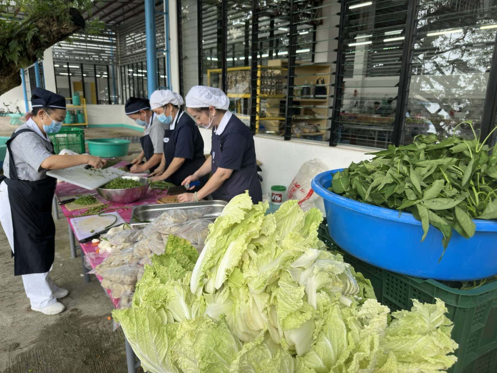 Leafy greens are among the ingredients volunteers procured for the medical mission’s vegetarian meals.