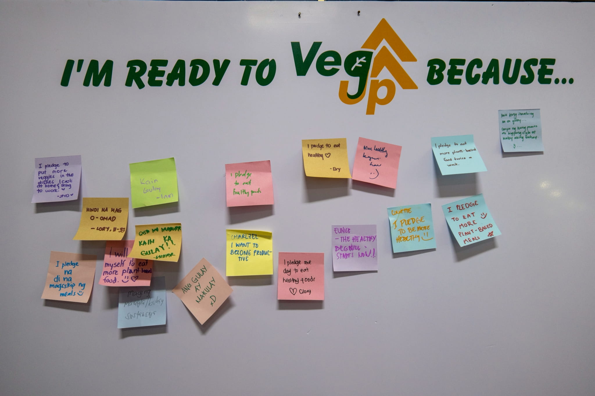 Following their lunch, students stopped by the booth to write their pledges in support of a more plant-based lifestyle.