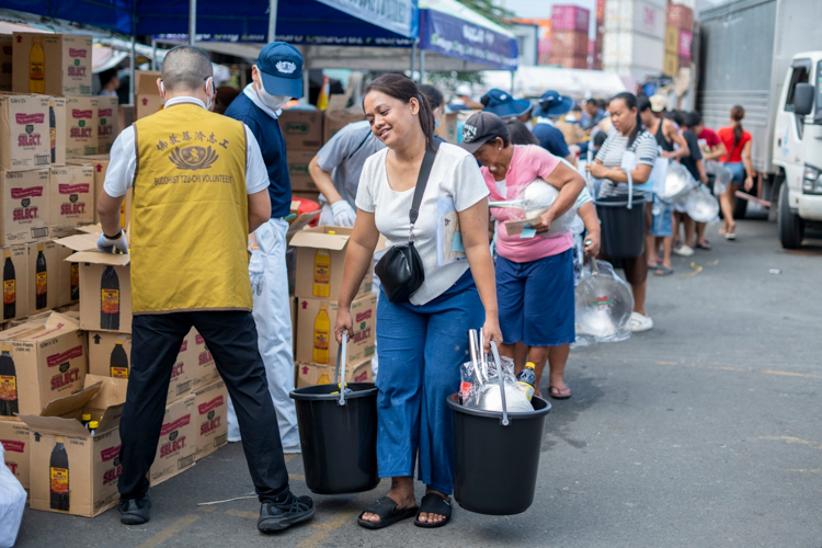 For Tzu Chi, this might be the most fulfilling reward to witness from a beneficiary—their sincere smiles full of hope.