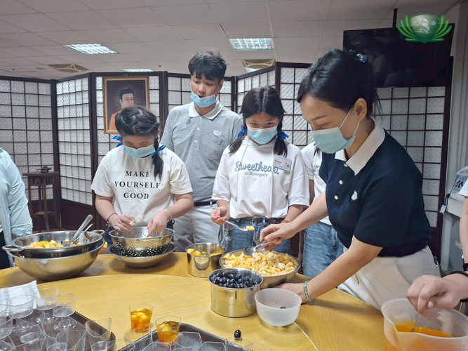 Younger camp participants were called in to help make a gelatin dessert.
