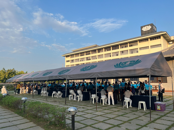 A registration area for medical mission patients is set up in the spacious, airy grounds of Buddhist Tzu Chi Campus in Sta. Mesa, Manila.