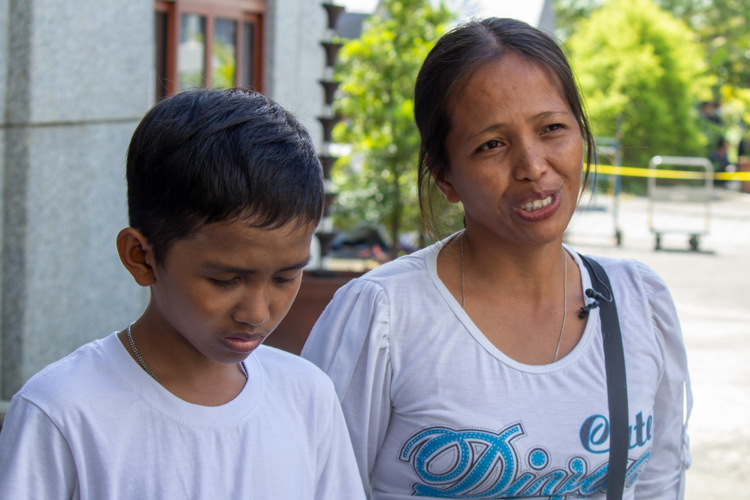 Diagnosed with acute lymphoblastic leukemia in 2016, Christian Memoria (left) has his mother Cecil (right) to thank for moving heaven and earth to find the resources for his treatment. Her effort and sacrifices paid off: In December 2023, doctors pronounced Tzu Chi medical assistance beneficiary Christian cancer-free, after only five of 14 chemotherapy cycles. 【Photo by Marella Saldonido】