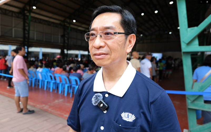 “I am very happy because I was able to be of help, especially in crowd control,” says Tzu Chi volunteer Paquito Ngo.