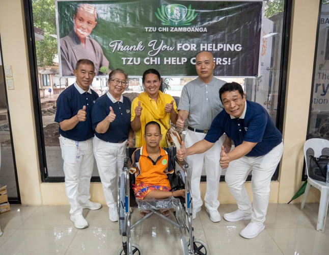 Baby Jane Remedios, one of the recipients of the wheelchairs from Tzu Chi Foundation, has a congenital disability that led to challenges in the development of her arms and legs.