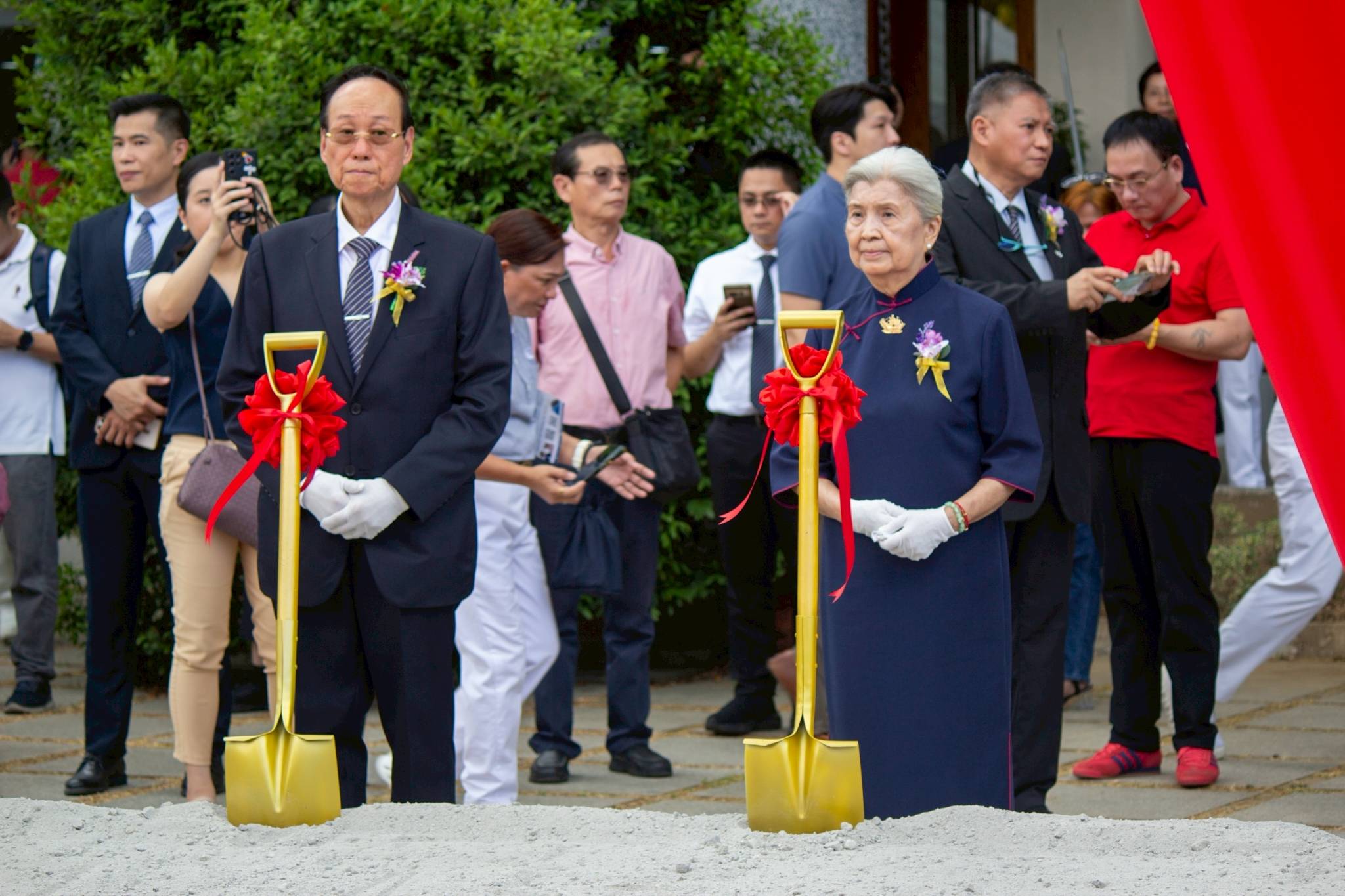 Everybody was invited to participate in symbolic shoveling at the groundbreaking site.