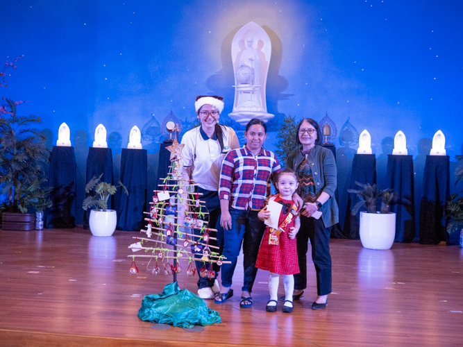 A student wins the Eco Warrior Champion (Pre-Kindergarten Division) award for her creative Christmas tree made using bamboo.