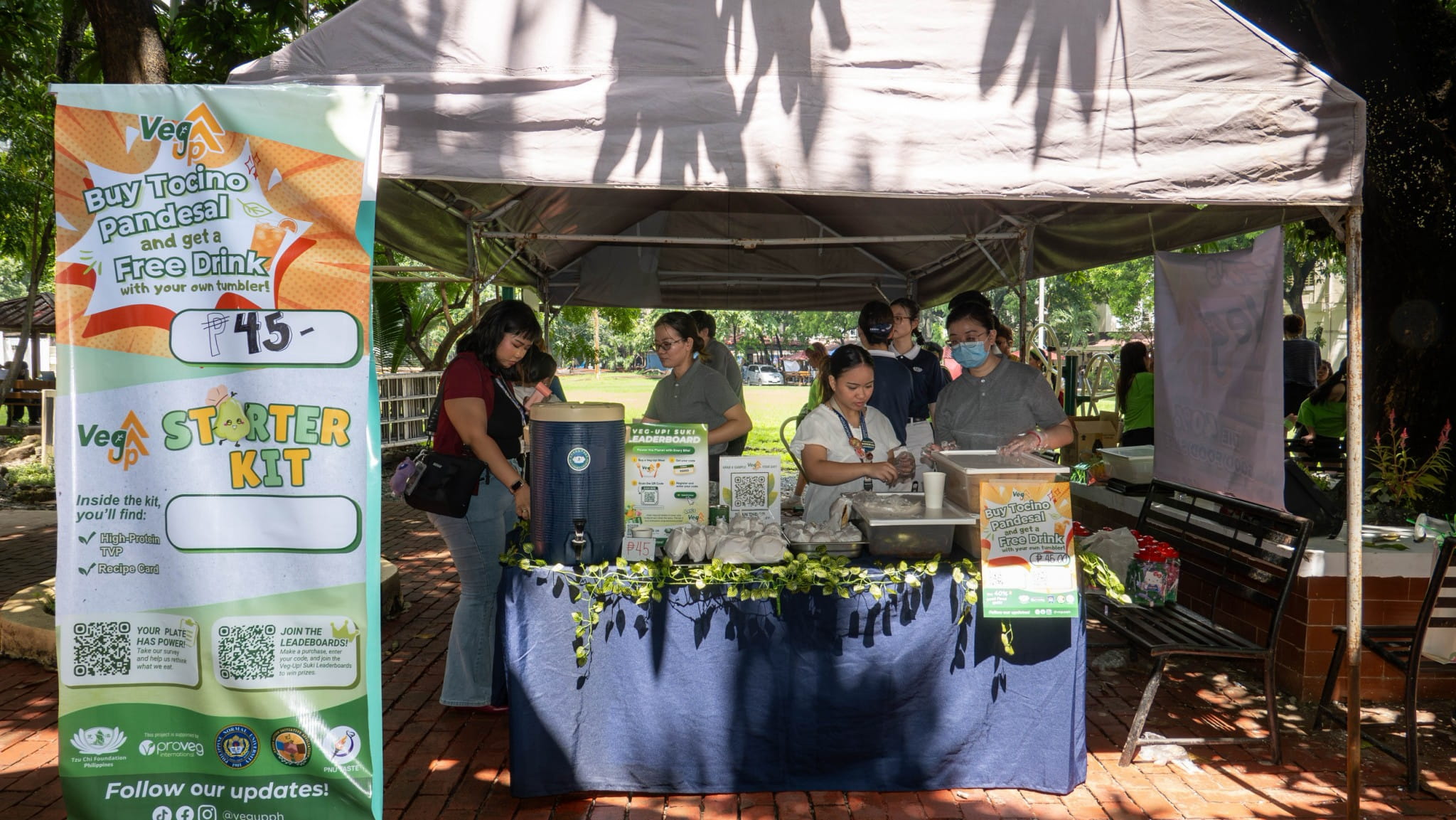 Getting ready to sell tocino pandesal and a free drink 