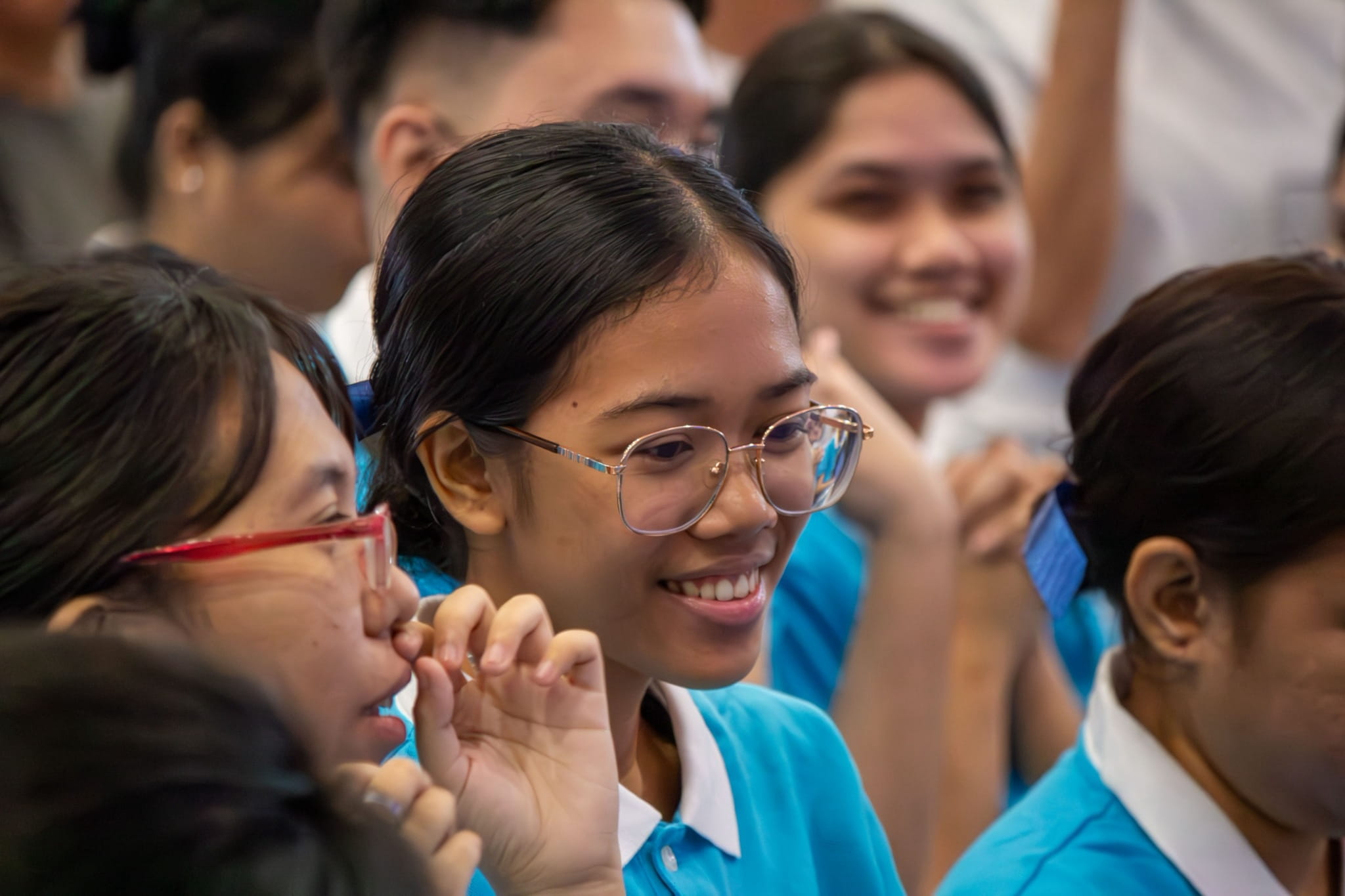 Hannah Lyka Mabatan (center) shares a light moment with her fellow scholars during the awarding ceremony on September 13, 2026, at the Jing Si Hall, Buddhist Tzu Chi Campus in Sta. Mesa, Manila. 