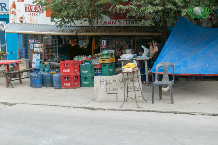 On the way to San Remigio, signs calling for help could be seen on the streets.