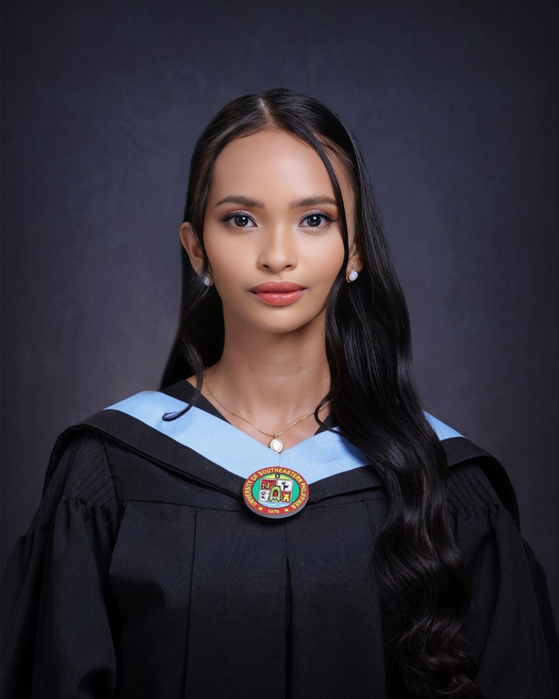 Her cleverness and confidence led her to finish her Bachelor of Early Childhood Education as magna cum laude at the University of Southeastern Philippines.