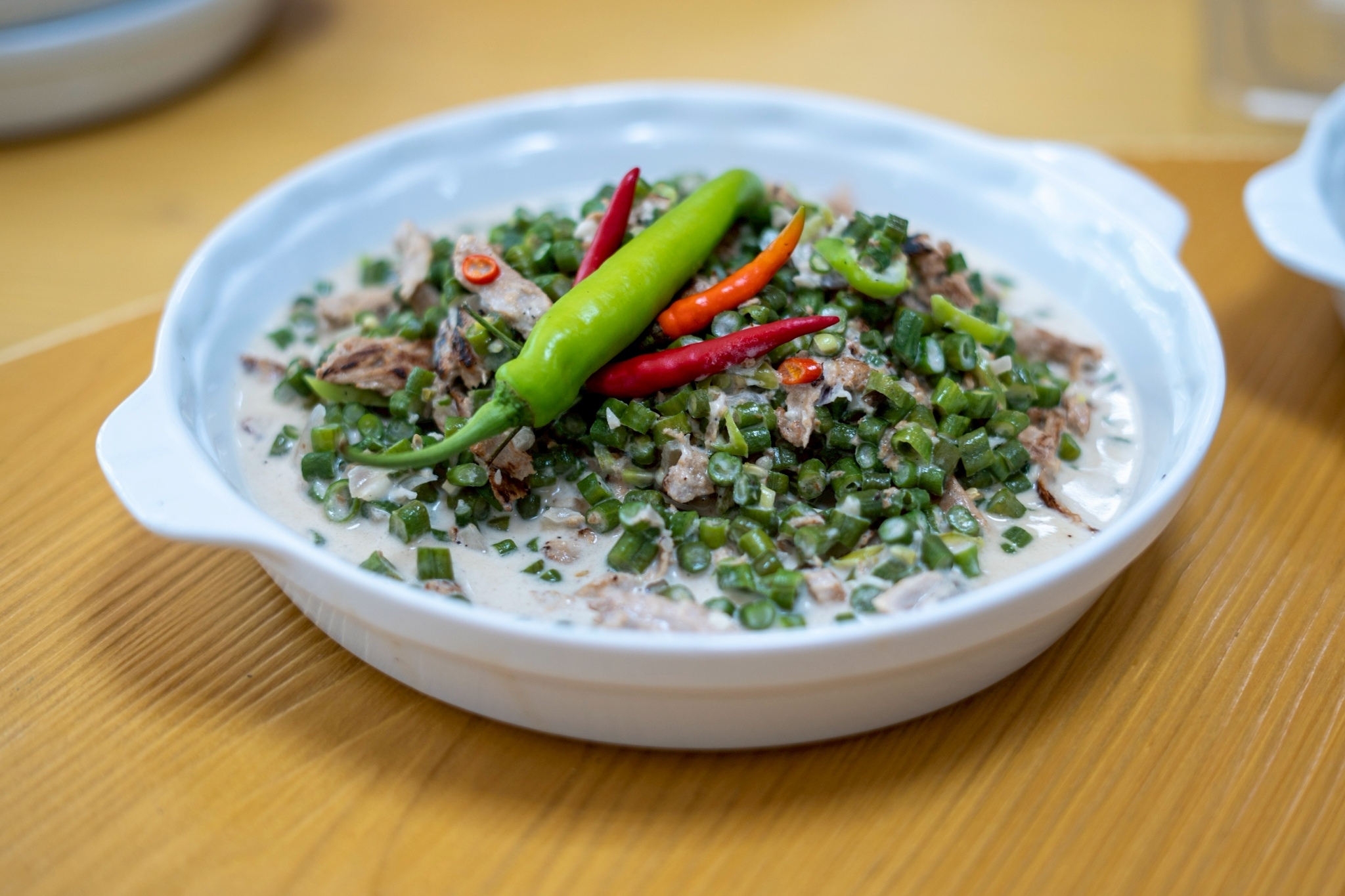 Bicol Express (green beans with textured vegetable protein shreds in coconut milk topped with chili) is the first dish among the 10 vegetarian dishes prepared in the culinary training. 