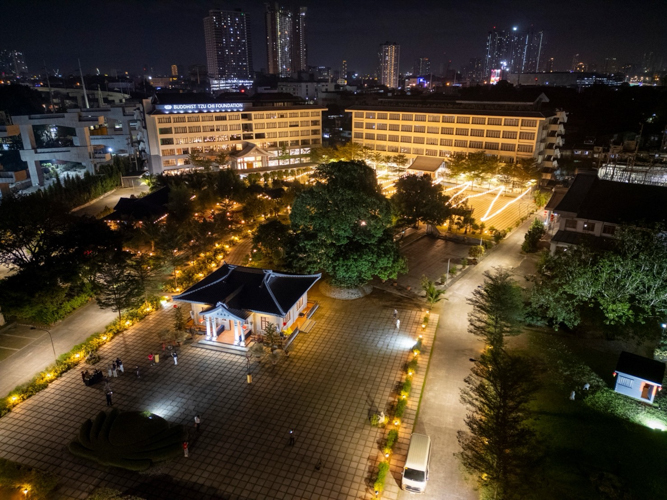 BTCC’s golden-lit facade illuminates the night sky, symbolizing Tzu Chi's role as a light of hope and service to others.