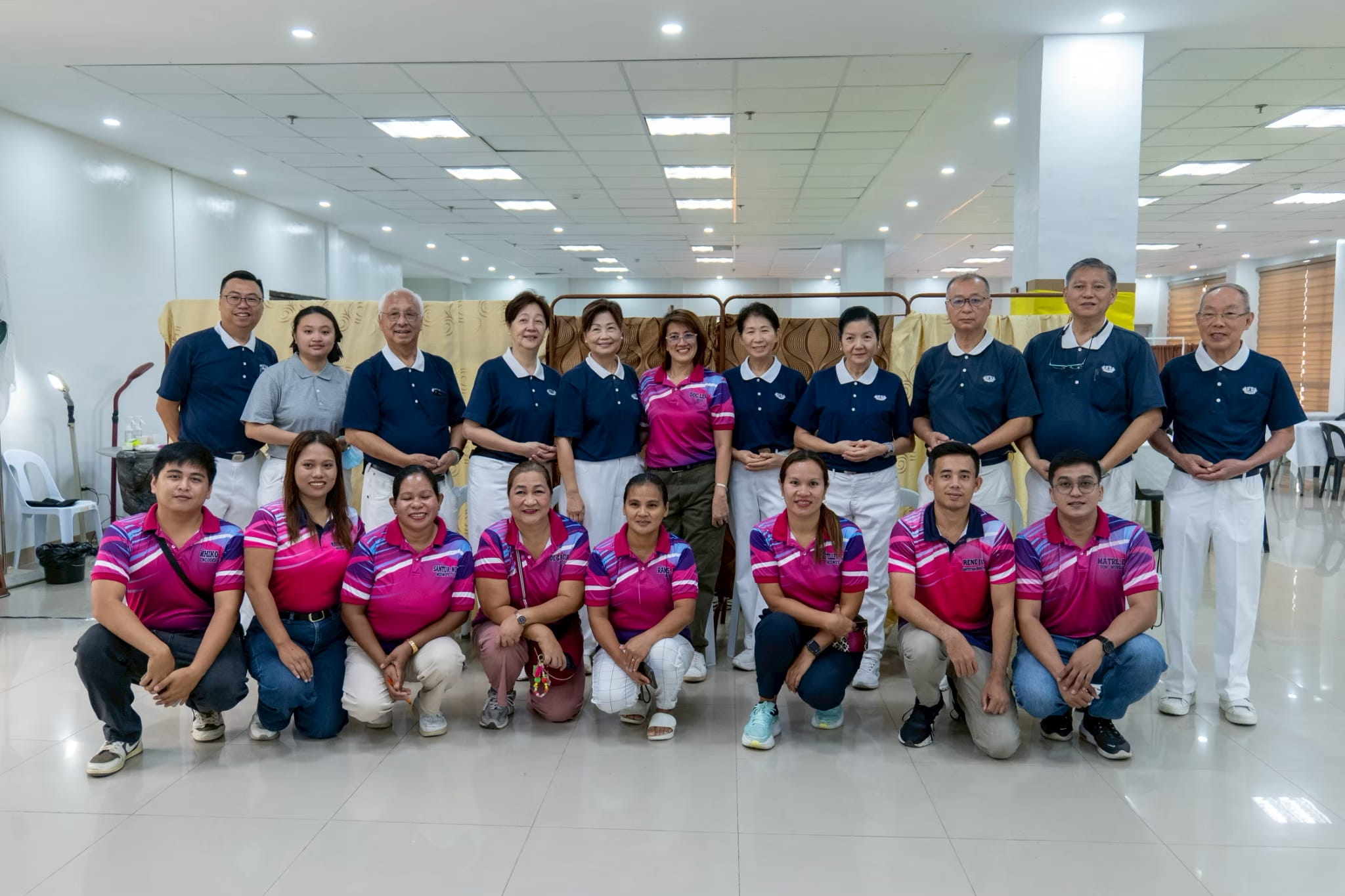 (Back row, fourth from right) With fellow volunteers and local government personnel at Tzu Chi’s 290th medical mission in Victoria, Oriental Mindoro