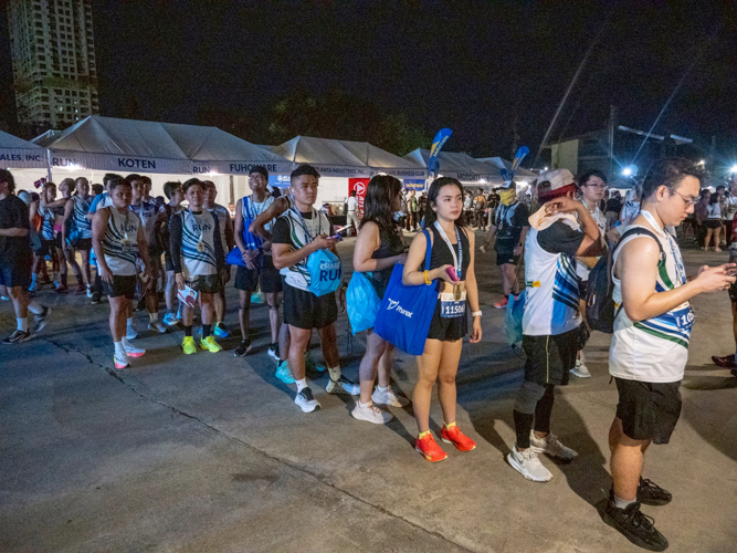 Sponsor booths drew long lines of runners eager to enjoy the freebies and giveaways.