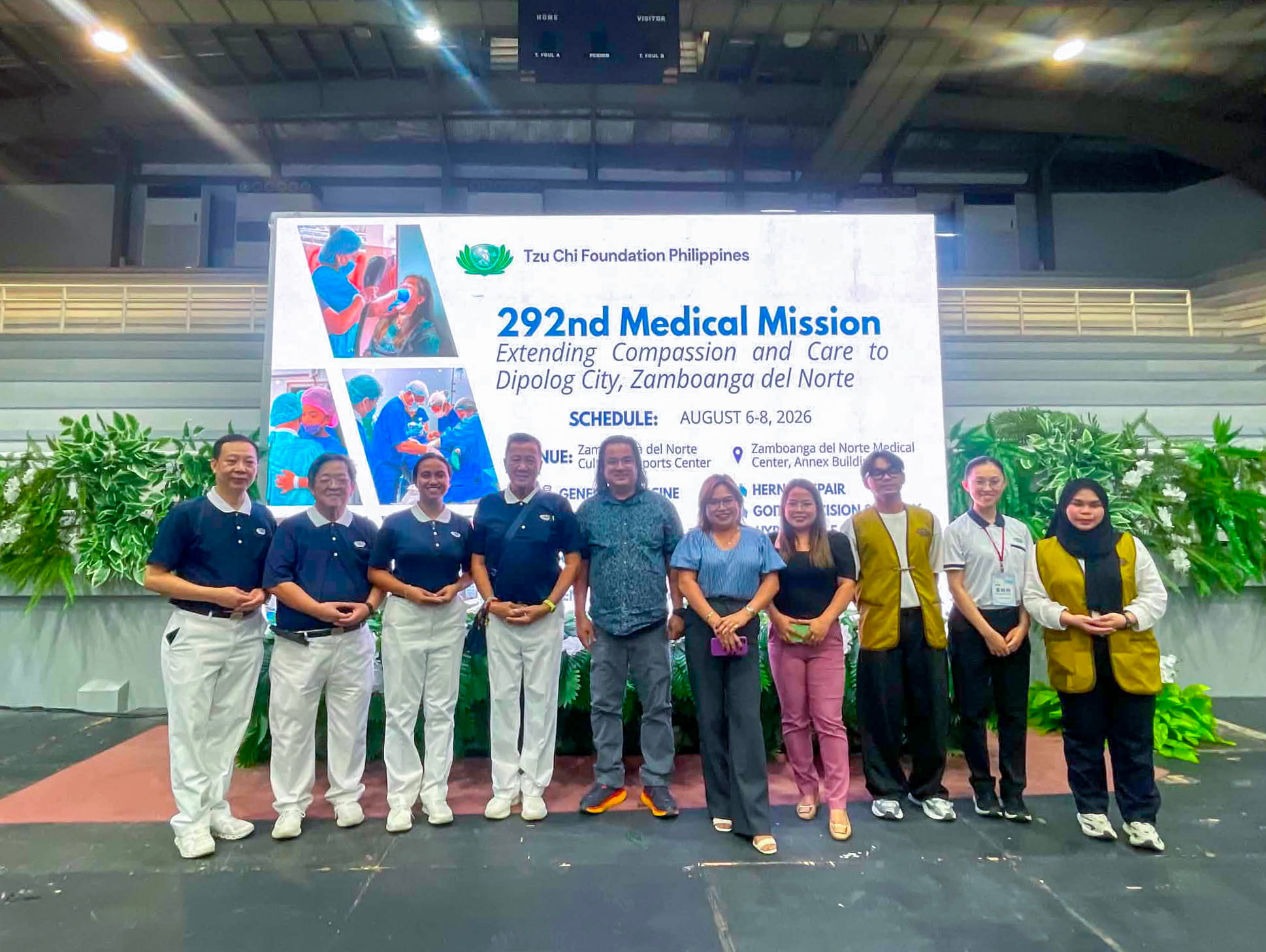 Doctors and volunteers from the ophthalmology team come together for a group photo. 