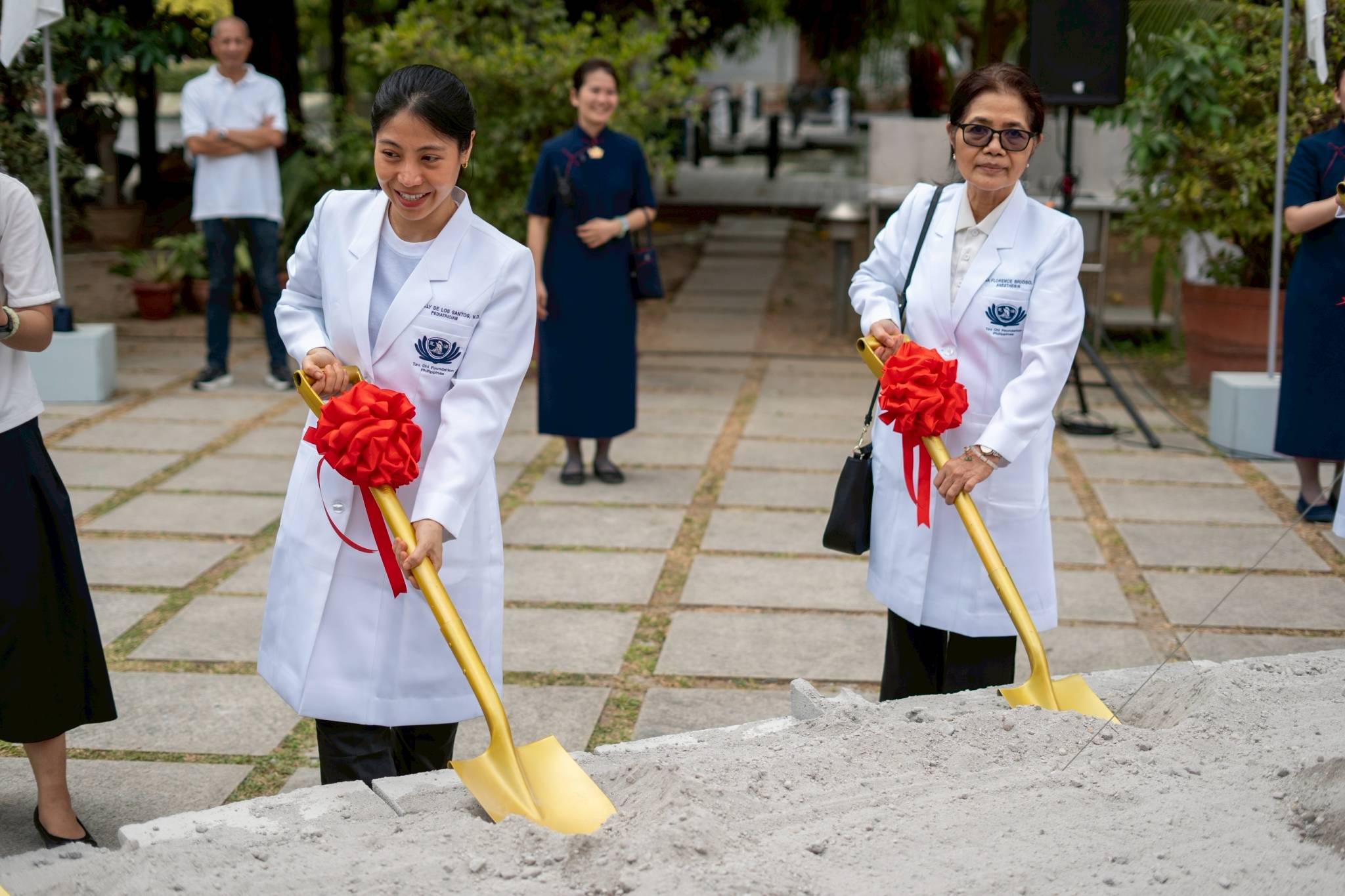 Everybody was invited to participate in symbolic shoveling at the groundbreaking site.