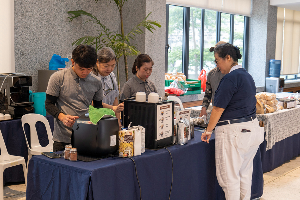 Adding warmth to the event, the delightful fragrance of freshly made coffee wafts gently from the coffee station.