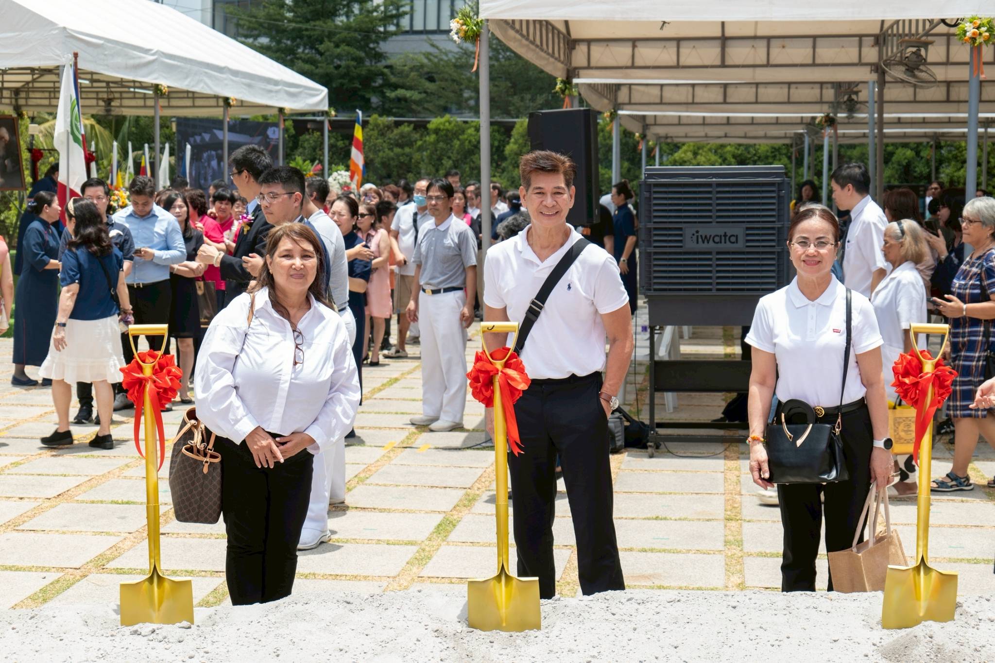 Everybody was invited to participate in symbolic shoveling at the groundbreaking site.