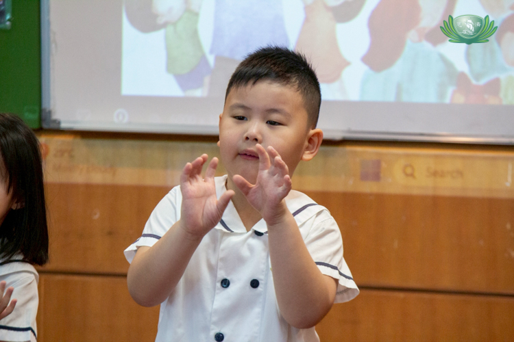 A student performs a dance during the Filial Piety celebration.