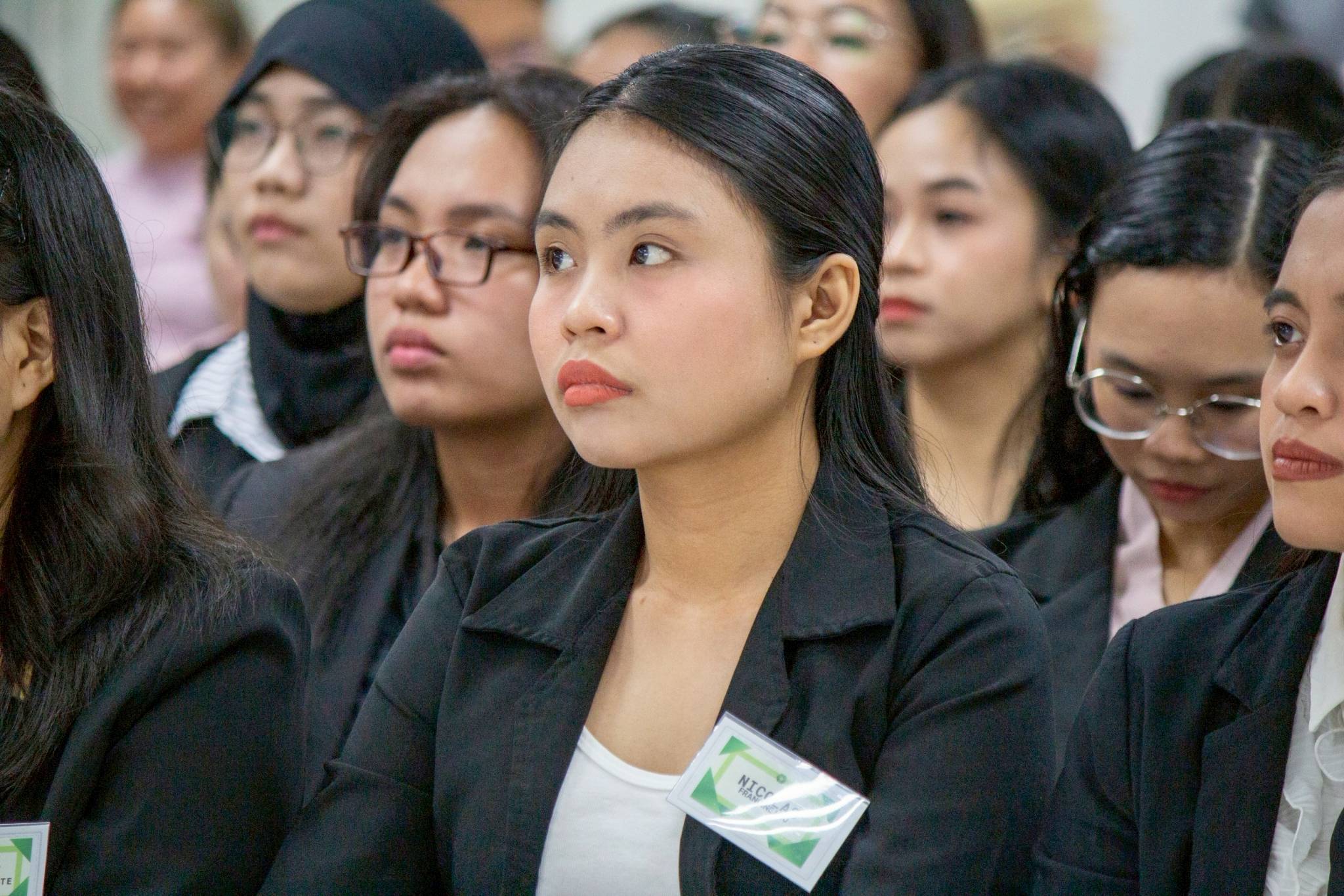 Scholars listened attentively to preparation tips before meeting their assigned interviewers.
