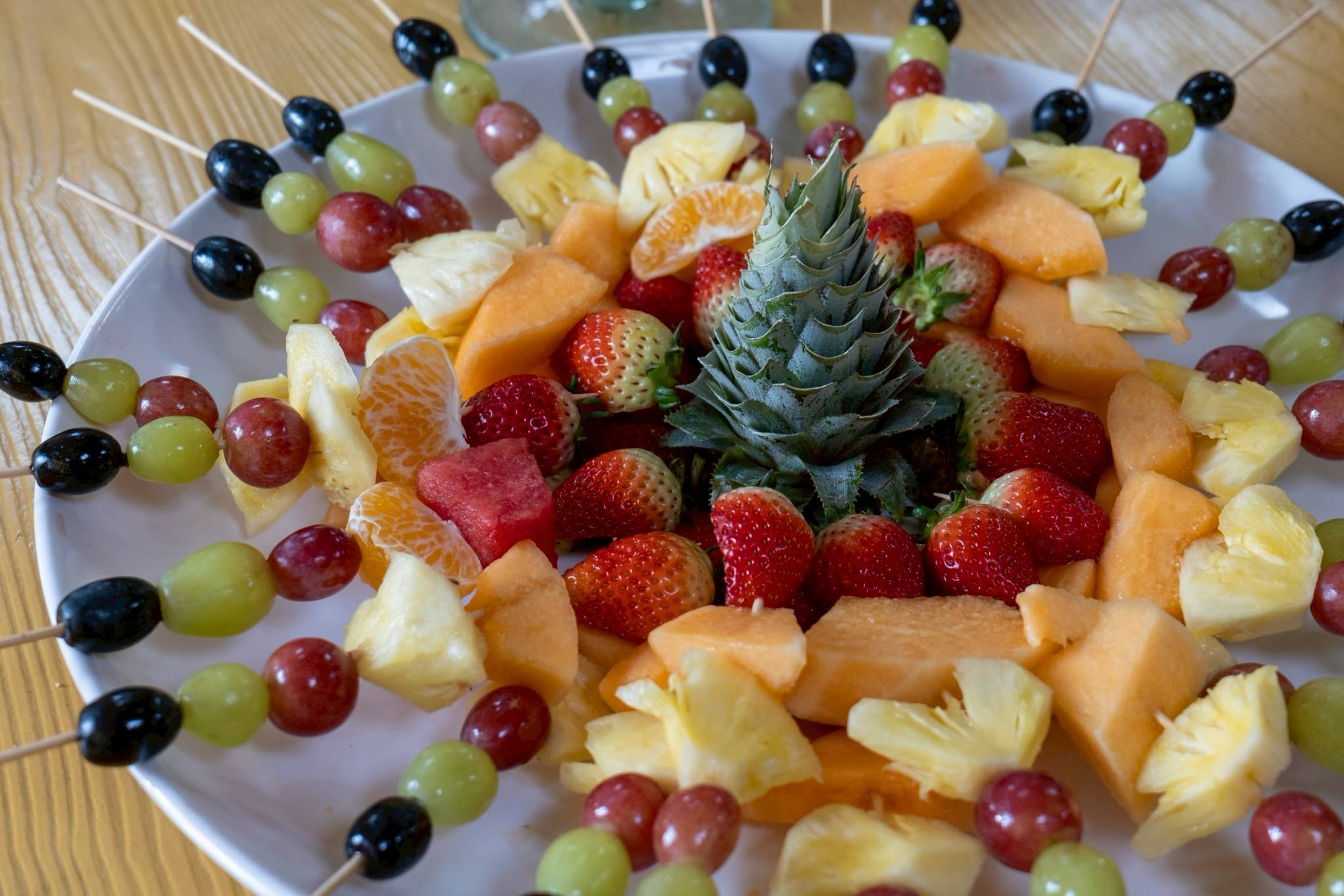 Skewered fresh fruits are refreshing to the palate.