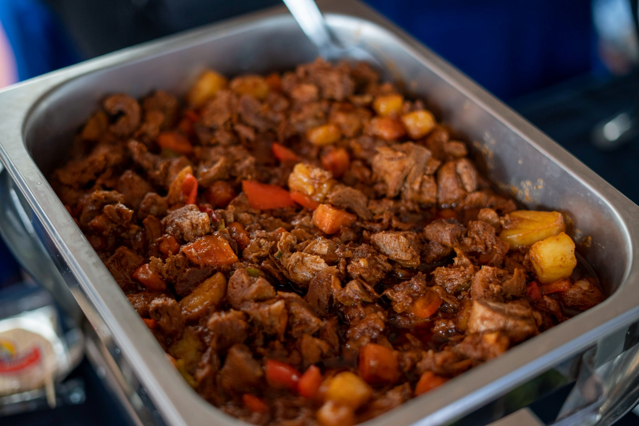 Plant-based menudo is a savory tomato-based stew made from Textured Vegetable Protein (TVP), carrots, and potatoes. 