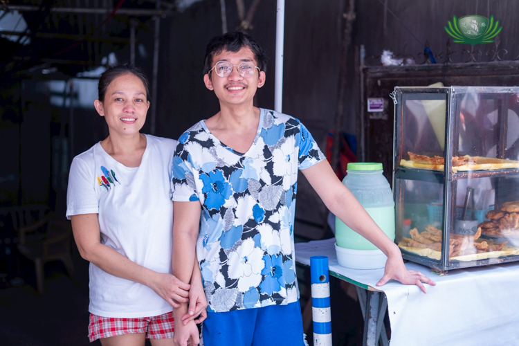 At home, James Llenos helps his mother Veronica (left) run their small business selling snacks.