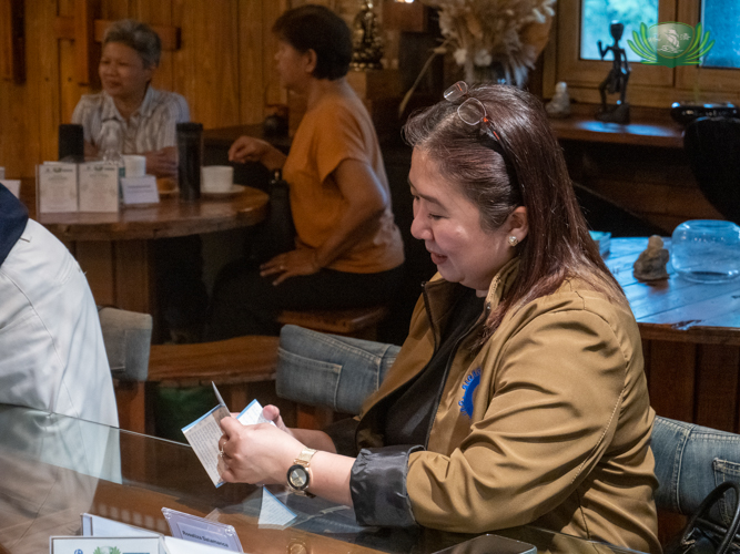 Rose Salamanca, commercial lead from Globo Asiatico, reads a pamphlet of Jing Si Aphorisms by Dharma Master Cheng Yen.