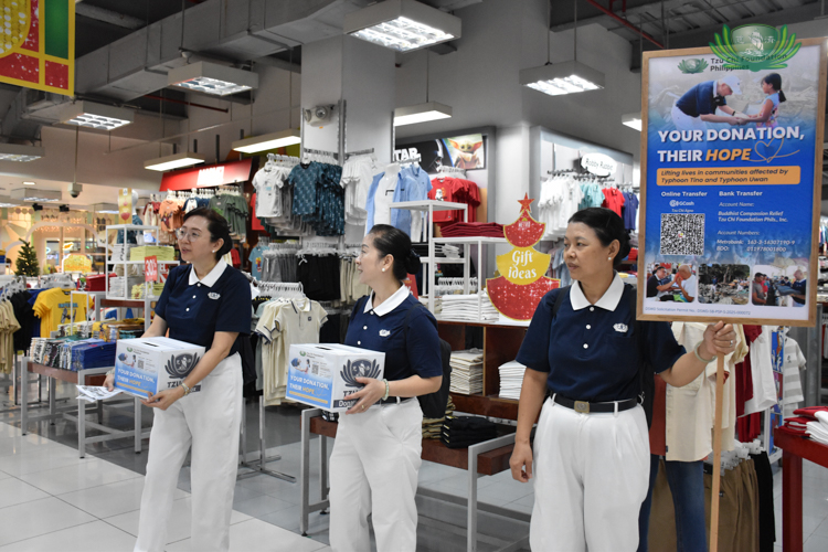 Volunteers stand at strategic points of Metro Department Store and supermarket to invite as many shoppers to donate.