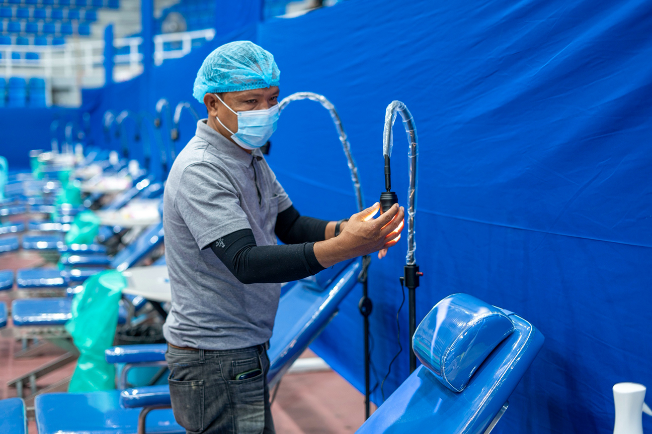 Preparations for the medical mission begin hours before the opening with the setup of dental essentials. 