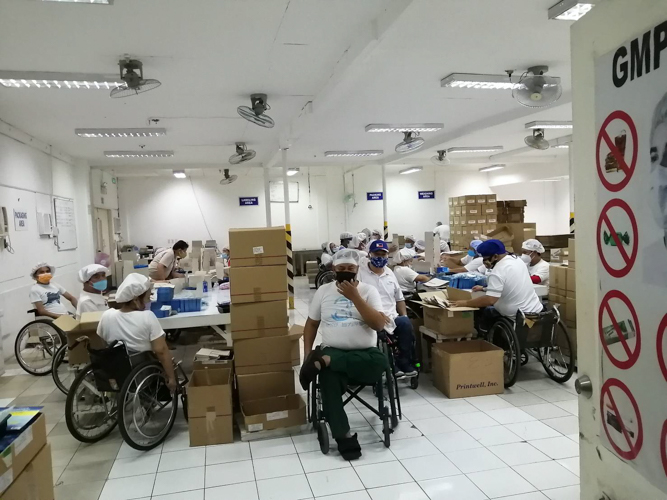 PWD at the medicine repacking section of Tahanang Walang Hagdanan【Photo by Matt Serrano】