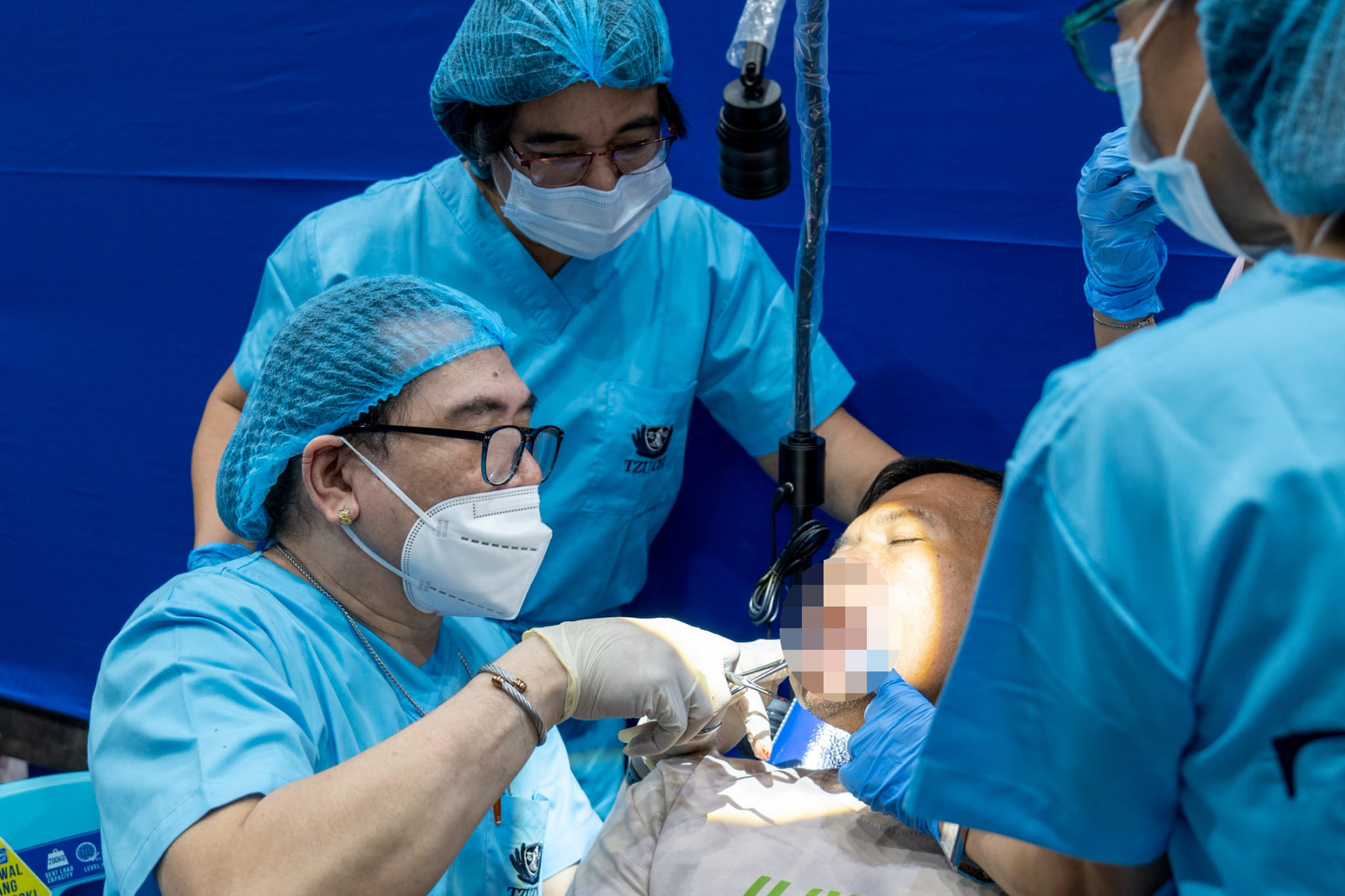Beneficiary Roland Matias sought a tooth extraction but instead underwent a successful procedure to remove a growing periapical cyst in his gums.