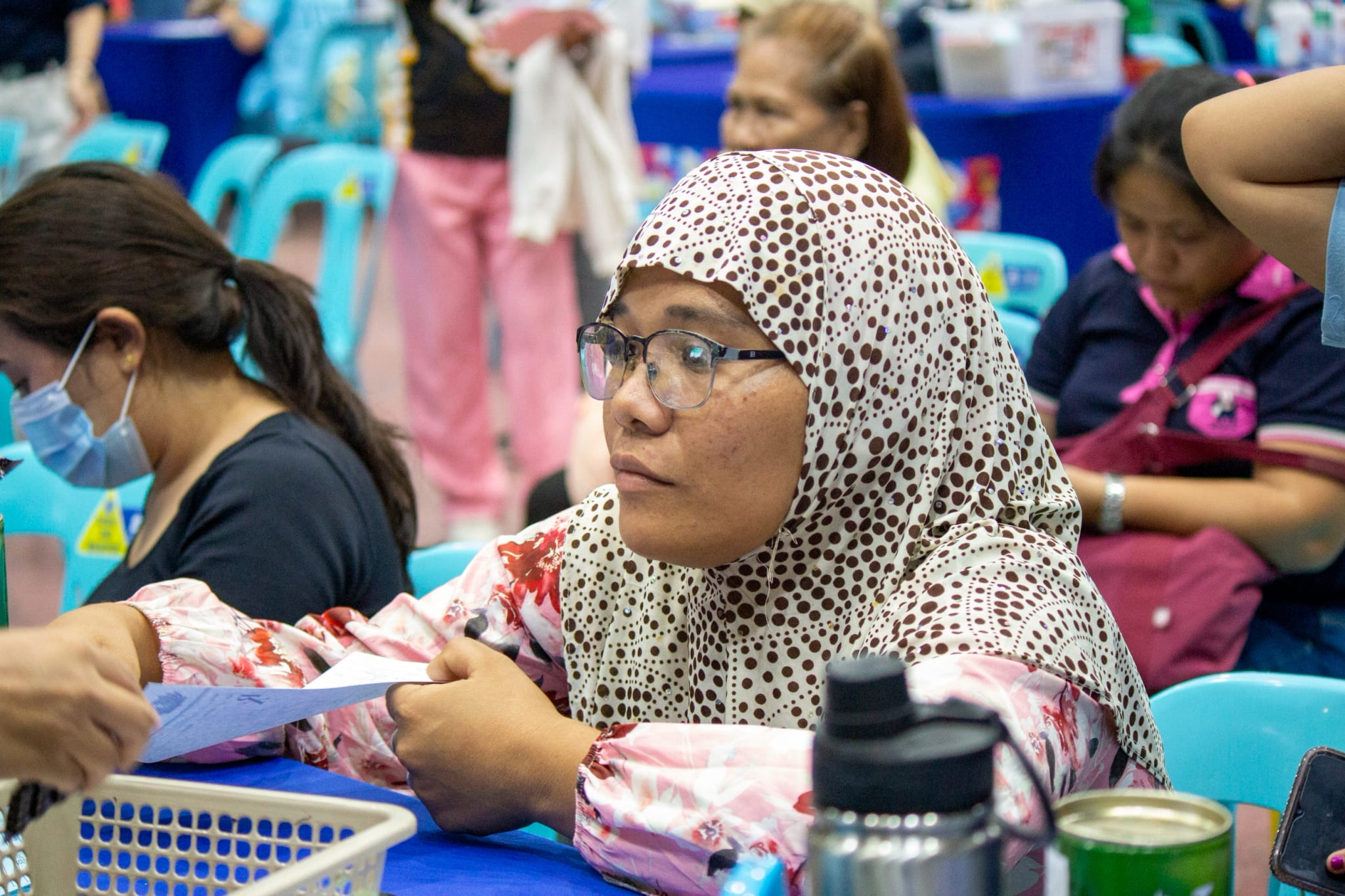 Patients with prescriptions receive free medicines after their medical consultations.