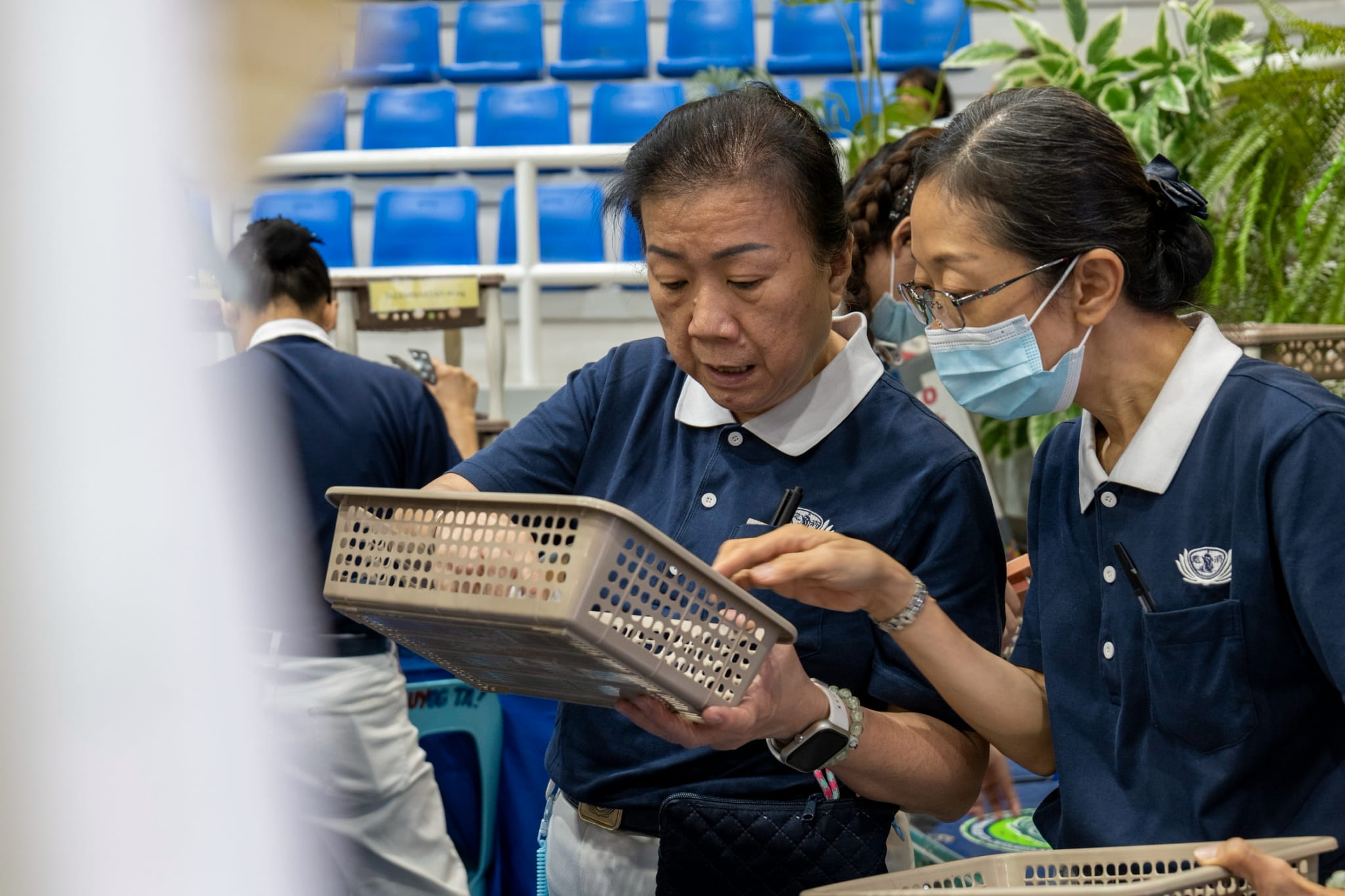 Pharmacy volunteers ensure that patients receive the correct medicines according to their prescriptions.