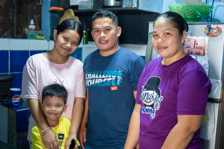 Rhea Amilano poses for a family picture along with her husband Jonel and their two children. No matter what hardship she faces, Amilano draws strength from her beloved family.