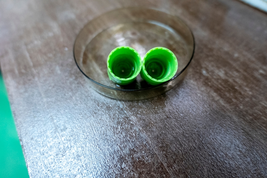 These plastic bottle caps gain another life as they are used to remove pollutants from wastewater, its corrugated texture being beneficial for biofilms to cling onto.