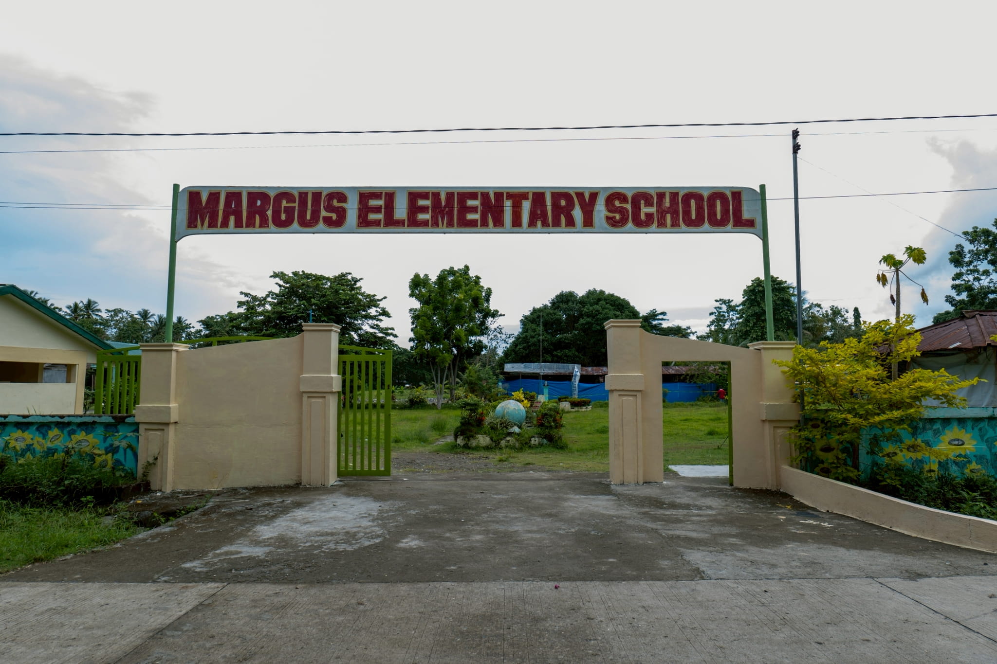 Tzu Chi volunteers and staff visit Margus Elementary School, where 640 learners continue through modular learning.