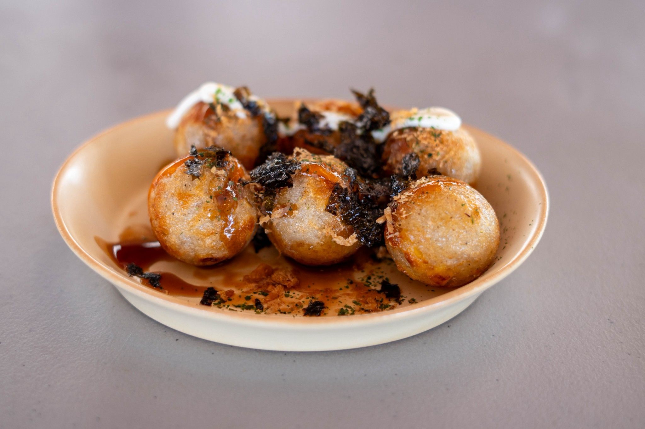 Tzu Chi Youth’s contribution to the food bazaar is vegetarian Takoyaki, a plant-based version of the popular Japanese street food.