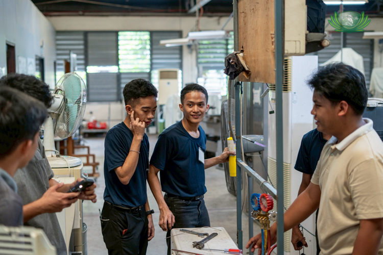 The scholars support one another as they observe, practice, and perform tasks individually in pursuit of skill mastery.