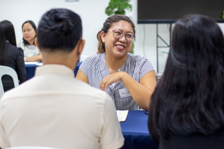 “For new hires, we always look at a person’s personality,” says Jhoy Sarmiento (center), a senior finance manager at Coins.ph and Tzu Chi scholar from 2006 to 2009. “The ability to accept challenges, show compassion, and have the heart for the job are important qualities we look for in a new hire.” 【Photo by Matt Serrano】