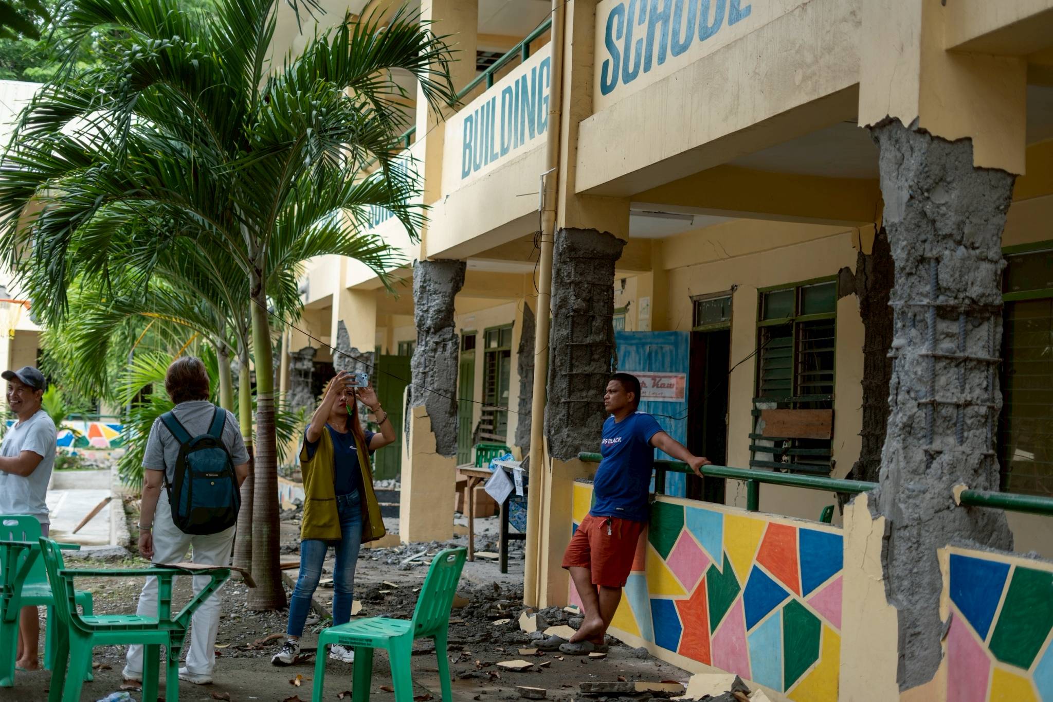 At Kalbay National High School, cement from this building’s posts were chipped away by the violent tremors. 