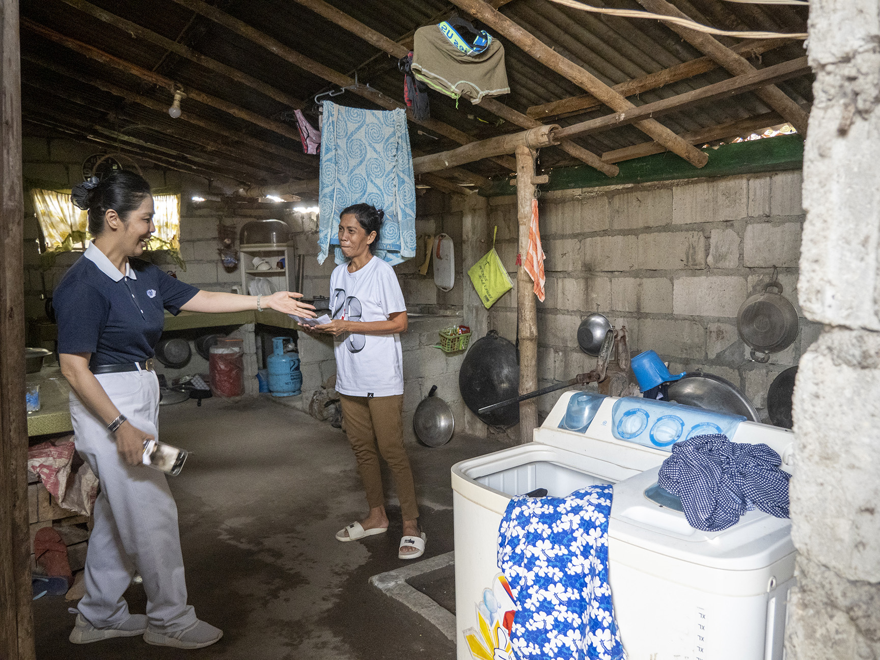 The family's matriarch showed the volunteers around their home, including the humble area where they prepared and cooked their meals.